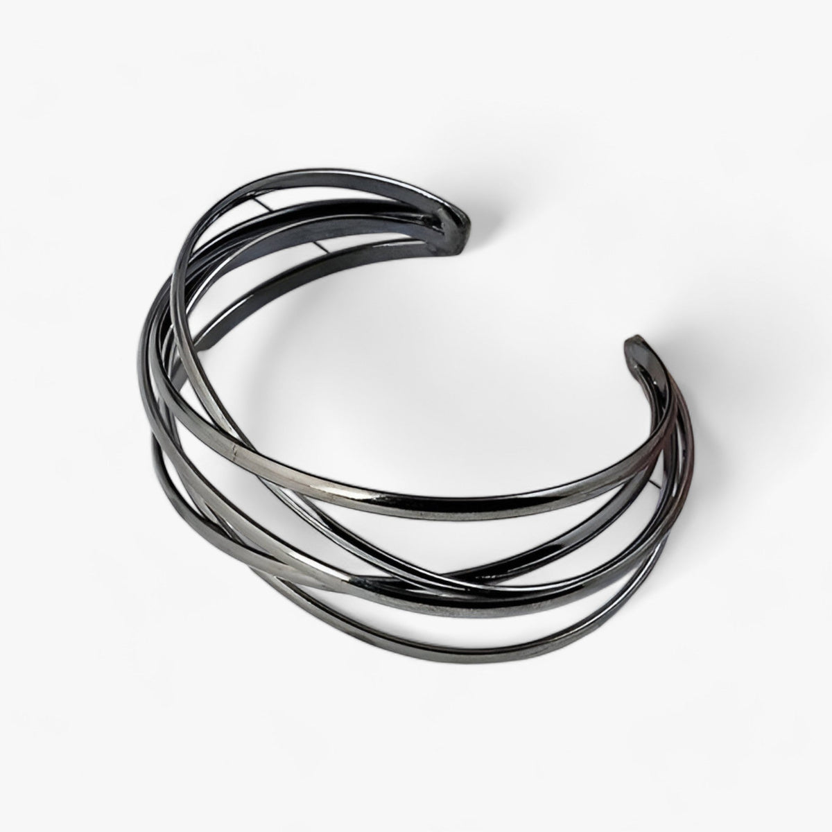 Open bangle met opengewerkt detail