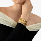 Gladde ronde armband in 18K goudkleurig roestvrij staal