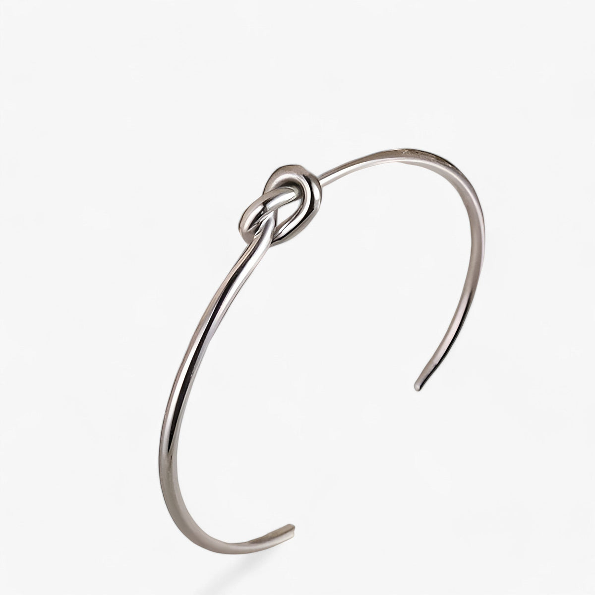 Gedraaide geweven armband in goudkleurig staal