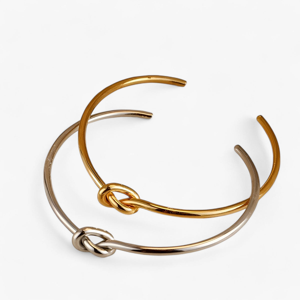 Gedraaide geweven armband in goudkleurig staal