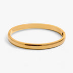 Gladde ronde armband in 18K goudkleurig roestvrij staal