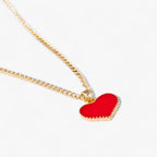 Ketting met rode harthanger en inscriptie