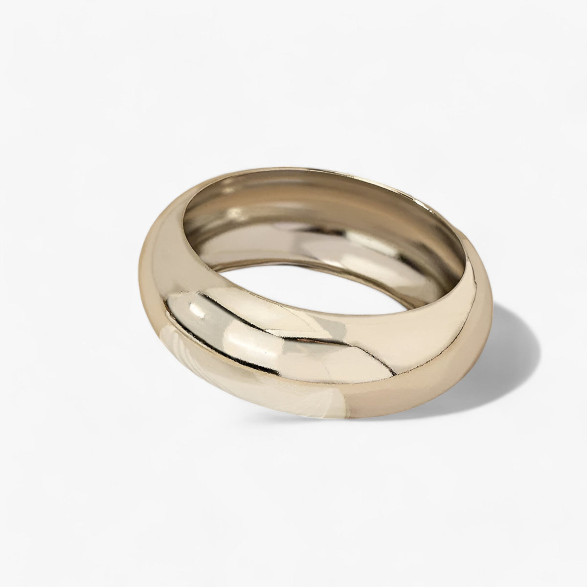 Brede gladde bangle met gebogen profiel