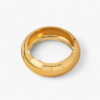 Brede gladde bangle met gebogen profiel