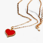 Ketting met rode harthanger en inscriptie