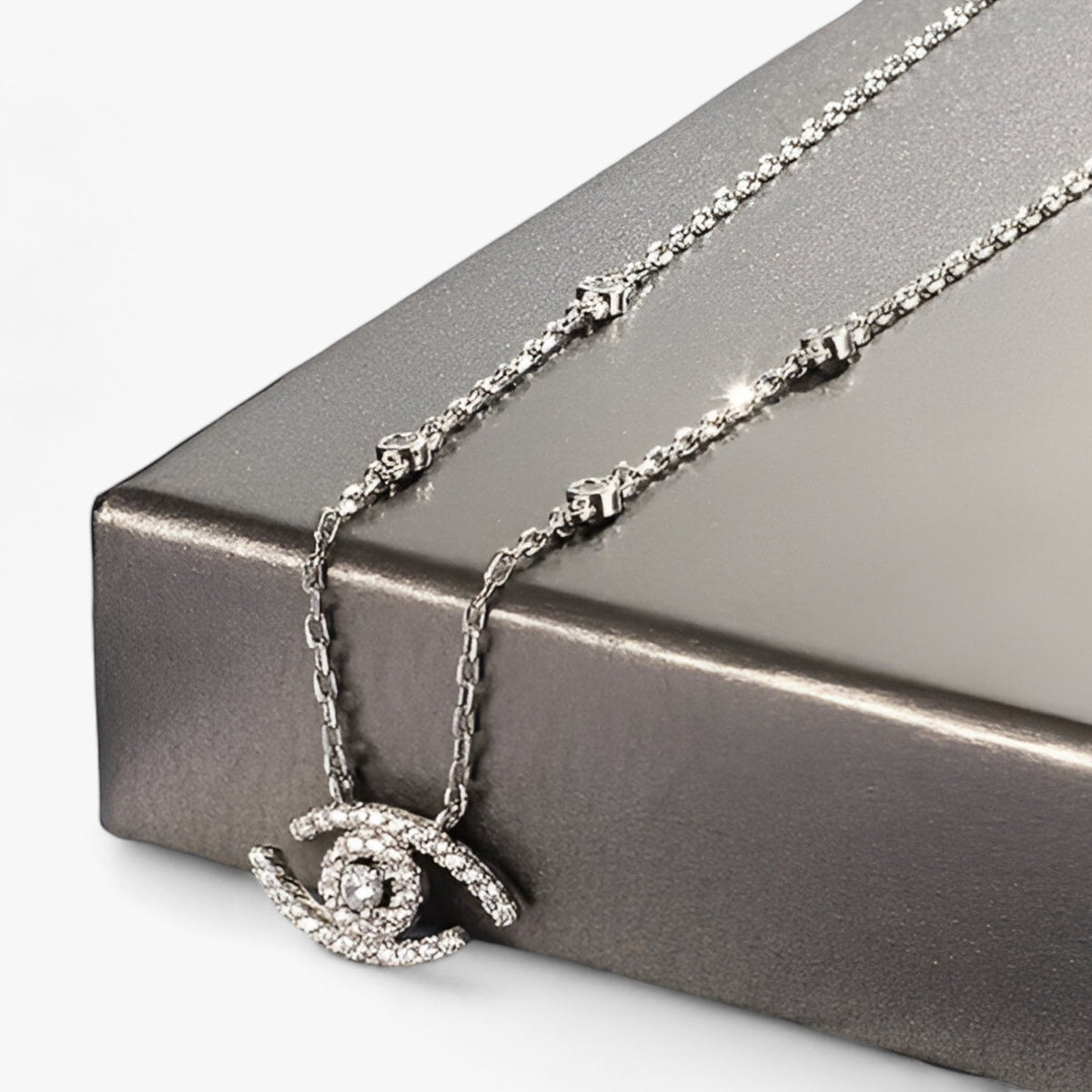 Set met ketting en armband met oogmotief, zilverkleurig
