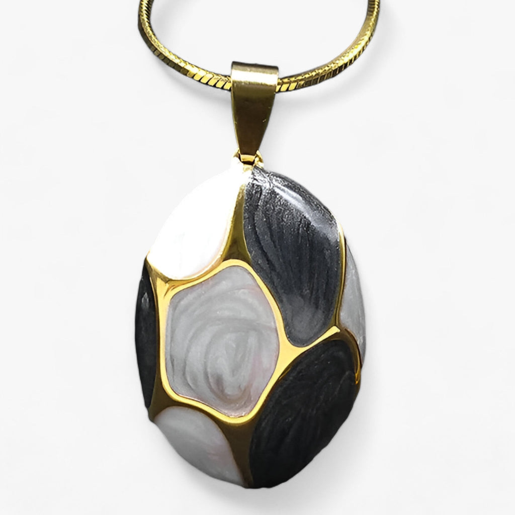 Ketting met bedelhanger in goudkleurig roestvrij staal