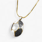 Ketting met bedelhanger in goudkleurig roestvrij staal
