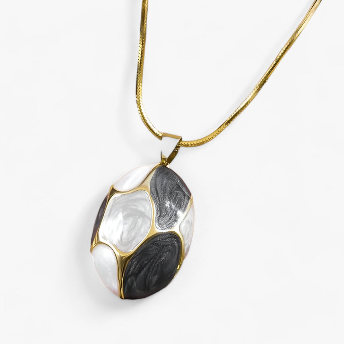 Ketting met bedelhanger in goudkleurig roestvrij staal
