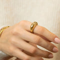 Ring met geometrisch patroon in roestvrij staal, goudkleurig
