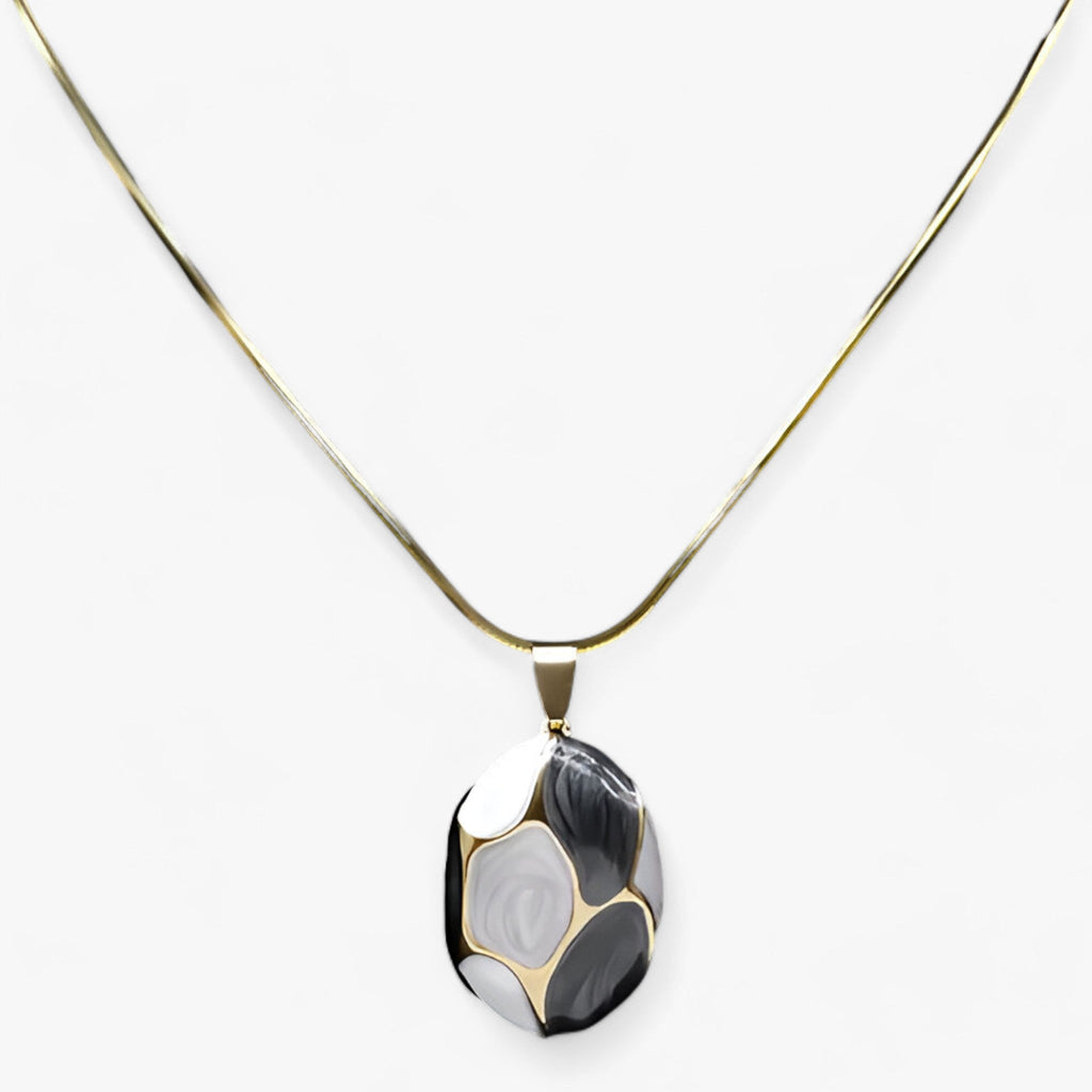 Ketting met bedelhanger in goudkleurig roestvrij staal