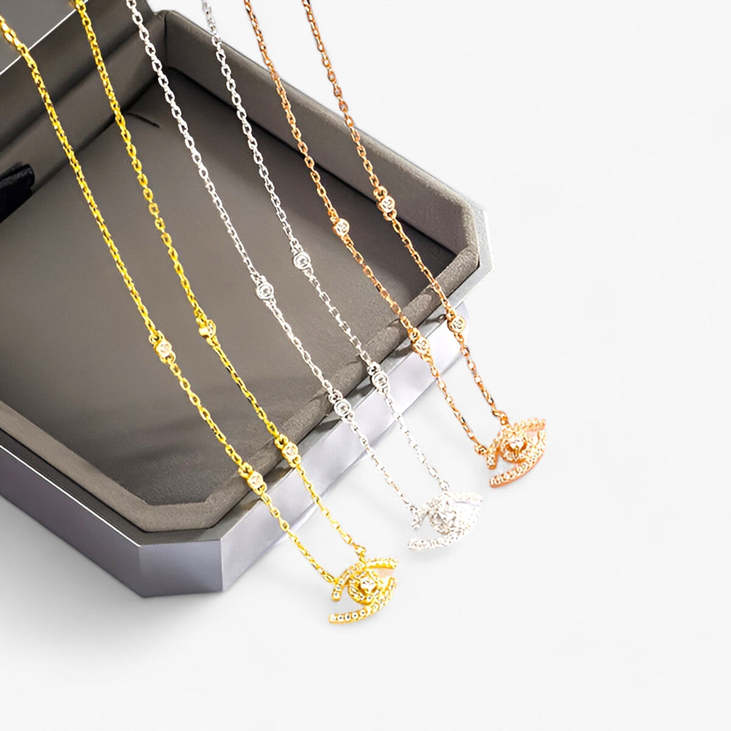 Set met ketting en armband met oogmotief, zilverkleurig