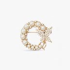 Vlinderbroche met parels en strass