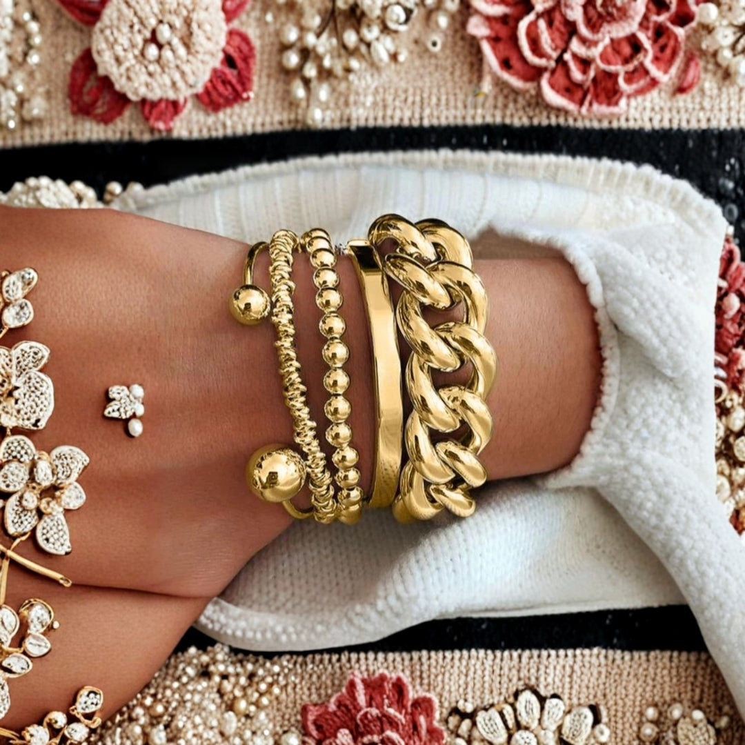 Goudkleurige set dikke schakelarmbanden