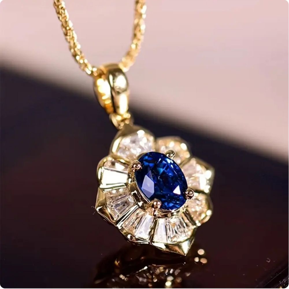 Ketting met azuurblauwe steen aan goudkleurige ketting