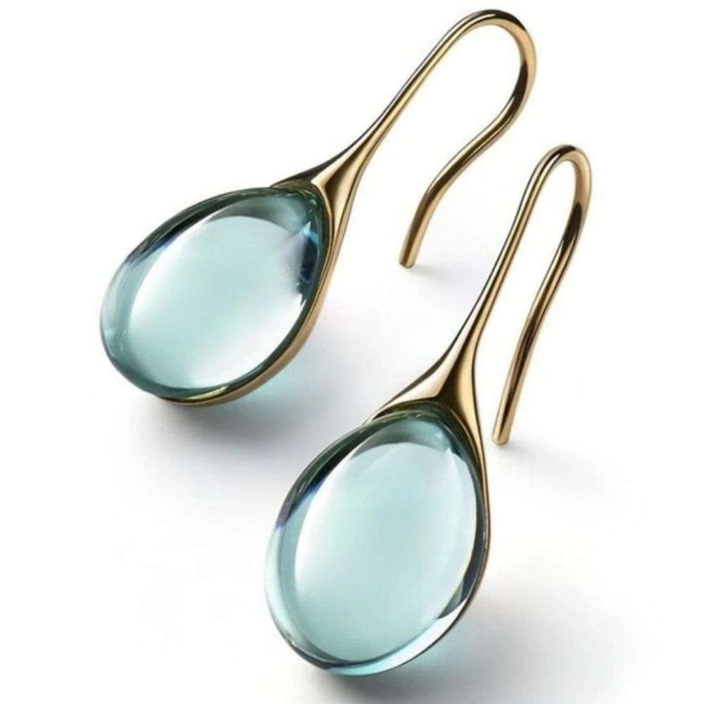 Goud- en zilverkleurige oorhangers met kristal