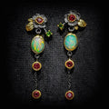 Boho lange oorhangers met opaallook en rode zirkonia