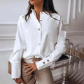 High-Neck Blouse with Long Sleeves and Button Cuffs