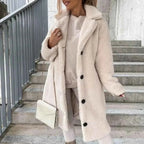 Single Breasted Belted Coat with a Turn Down Collar and Long Line