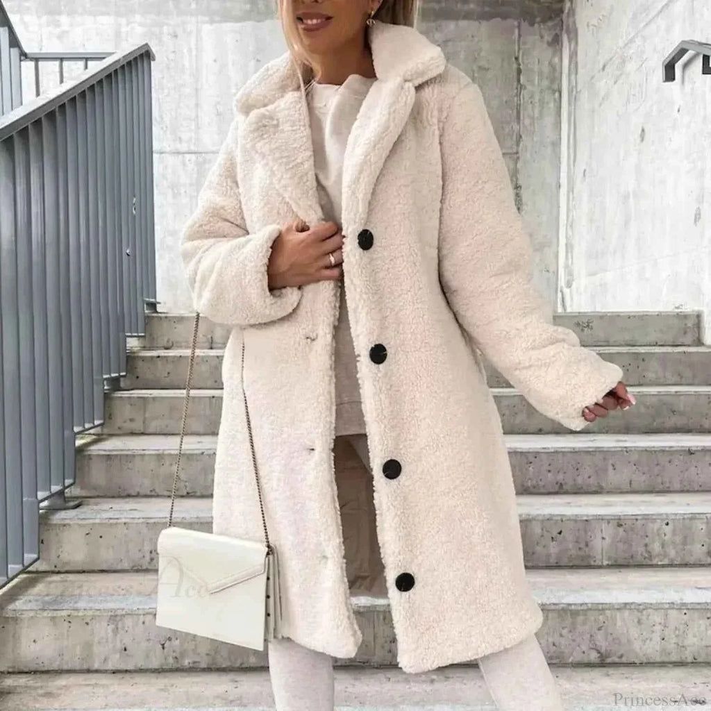 Single Breasted Belted Coat with a Turn Down Collar and Long Line