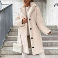 Single Breasted Belted Coat with a Turn Down Collar and Long Line