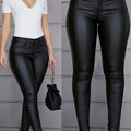 High-waist coated skinny jeans met medium stretch